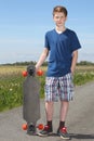 Boy with longboard Royalty Free Stock Photo