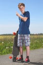 Boy with longboard Royalty Free Stock Photo