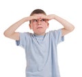 Boy look from under palm Royalty Free Stock Photo