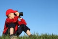 Boy looking through binoculars Royalty Free Stock Photo