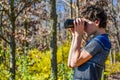Boy Looking Through Binoculars Bird Watching