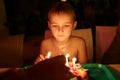 Boy looking at birthday cake Royalty Free Stock Photo