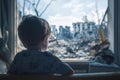Boy Looking at City Ruins Outside Window Royalty Free Stock Photo