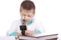 Boy looking into microscope Royalty Free Stock Photo