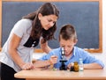 Boy looking into microscope Royalty Free Stock Photo