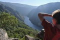 Boy looking at the river Sil from a natural viewpoint Royalty Free Stock Photo