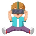 The boy is looking something on virtual reality and jumping