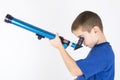 Boy looking trough telescope Royalty Free Stock Photo