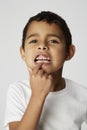 Boy with loose tooth