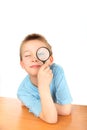 Boy with loupe Royalty Free Stock Photo