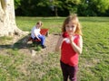 The boy is in love with a girl. First unhappy love. Partially defocused photo. The boy on the bench closed his eyes from the Royalty Free Stock Photo