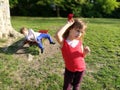 The boy is in love with a girl. First unhappy love. Partially defocused photo. The boy falls off the bench with the impression of Royalty Free Stock Photo