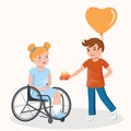 Boy in love with a heart shaped balloon gives a gift to his girlfriend in a wheelchair