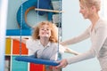 Boy lying on swing Royalty Free Stock Photo