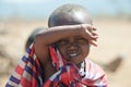 Maasai boy with eyes full of flies, Tanzania. Flies lay eggs into eyes so that the child could go blind Royalty Free Stock Photo