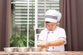 A boy is make bun for pizza Royalty Free Stock Photo