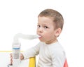 Boy makes inhalation with ultrasonic nebuliser Royalty Free Stock Photo