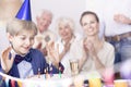 Boy making birthday wish Royalty Free Stock Photo