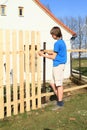 Boy making fence Royalty Free Stock Photo