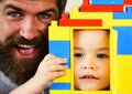 Boy and man play together, close up. Father and son Royalty Free Stock Photo