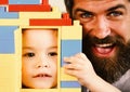 Boy and man play together, close up. Father and son Royalty Free Stock Photo