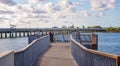 Boy And Man Fishing Off A River Pier Royalty Free Stock Photo