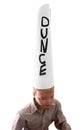 Boy mannequin wearing dunce cap Royalty Free Stock Photo