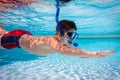 Boy in mask dive in swimming pool Royalty Free Stock Photo