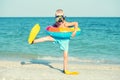 Boy in masks and fins are going to dive into the sea. Small diver. Royalty Free Stock Photo