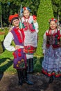 He boy member of the Polish folk dance GAIK holding the girl in hands.