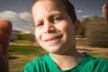 Boy on merry go round Royalty Free Stock Photo