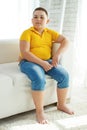 A boy with metabolic disorders. Child with the problem of childhood obesity. Overweight obese fat boy.