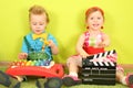 Boy with a metallophone and a girl with a Royalty Free Stock Photo