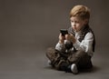 Boy with mobile phone Royalty Free Stock Photo