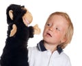 Boy with monkey puppet Royalty Free Stock Photo