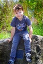 Boy on a monument Royalty Free Stock Photo