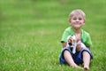 Boy with motley cat Royalty Free Stock Photo