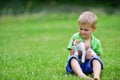Boy with motley cat Royalty Free Stock Photo