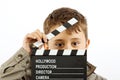 Boy with movie clapper board Royalty Free Stock Photo