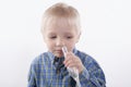 Boy and nasal aspirator Royalty Free Stock Photo