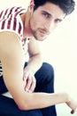 The boy next door. Closeup cropped portrait of a handsome man looking at you wearing casual jeans and a t-shirt. Royalty Free Stock Photo