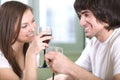 Boy with nice girl with wineglasses