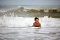 Boy in ocean waves Royalty Free Stock Photo