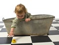 Boy in an old bath tab Royalty Free Stock Photo