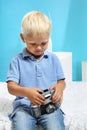 Boy with an old camera Royalty Free Stock Photo