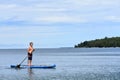 Boy Paddleboarding on Lake in Door County, WI