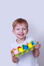 Boy with painted eggs Royalty Free Stock Photo