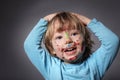 Boy with painted faces Royalty Free Stock Photo
