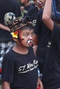 Boy is painted as the devil at Nyepi New Years Eve festival, Bali, Indonesia Royalty Free Stock Photo