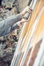 Boy painting graffiti close-up Royalty Free Stock Photo